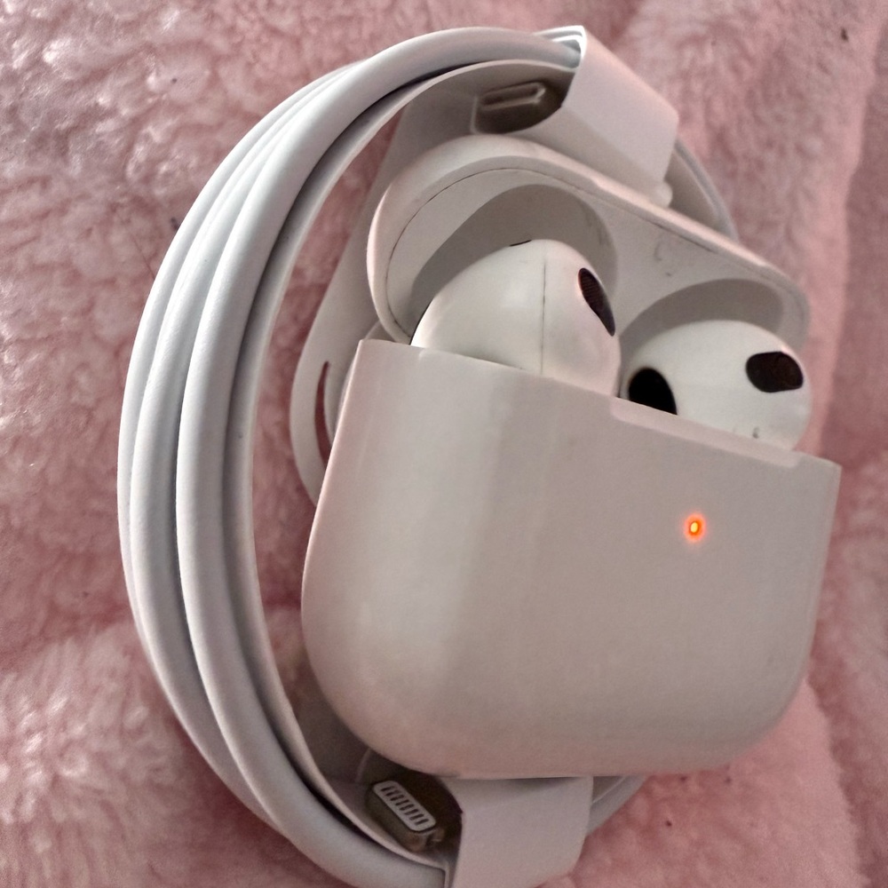 3rd generation AirPods, with case and charging cord.